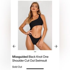 Black one piece side cutout swimsuit with shoulder knot